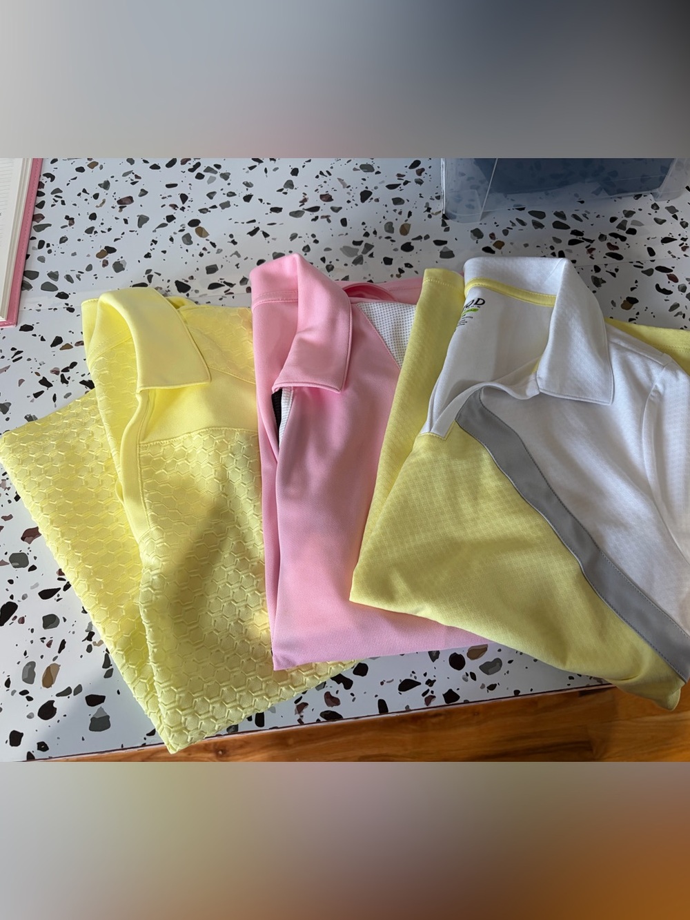 Izod Women’s Button-Down Polo Tops in Pastel Pink and Soft Yellow